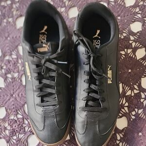 Puma Black Low-Top Sneakers with Gold Accents and Gum Outsole